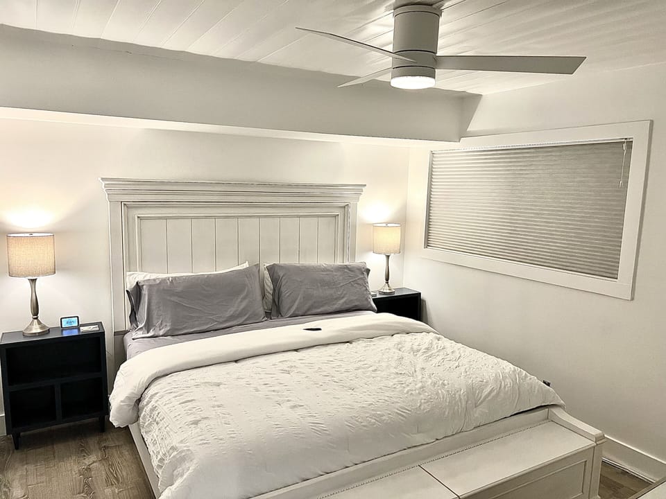Master Bedroom with King Sized Bed and 50” Smart Television.