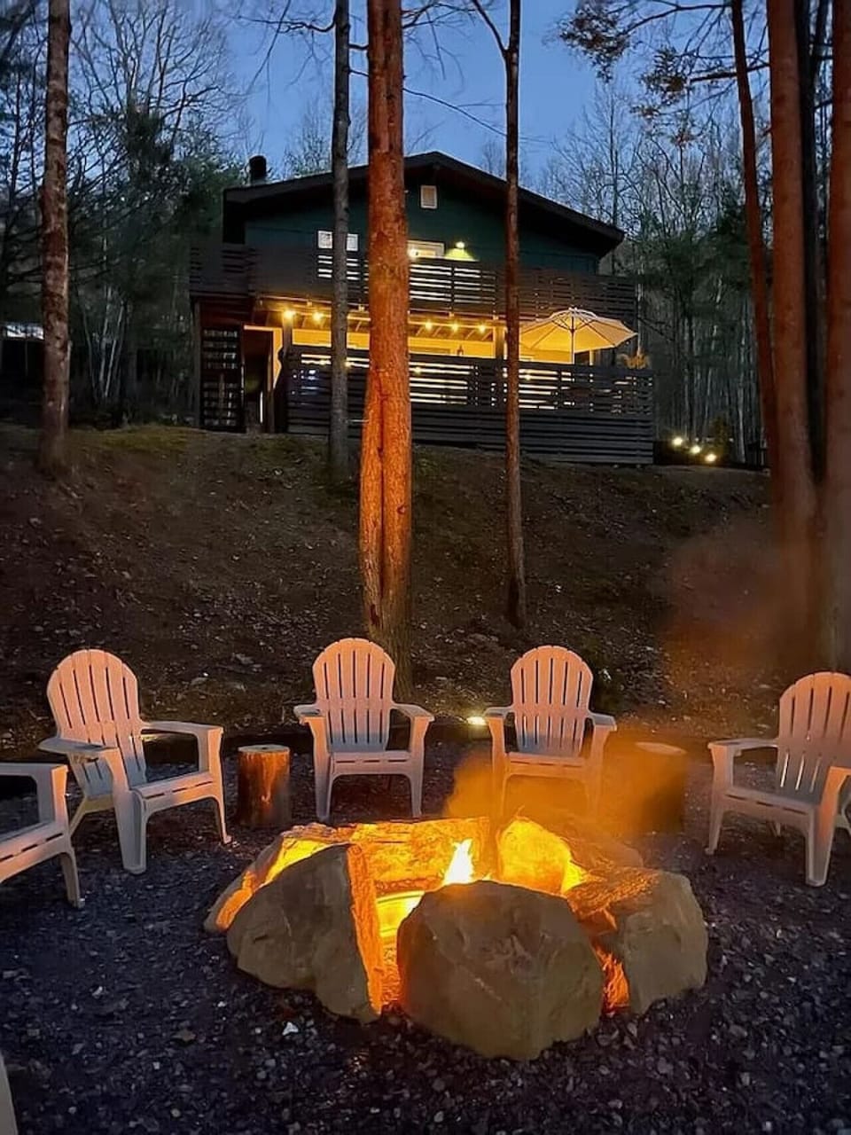 Wood-burning firepit area located just in front of the cabin is the perfect place to roast marshmallows, make S'mores and laugh about the day's adventures.