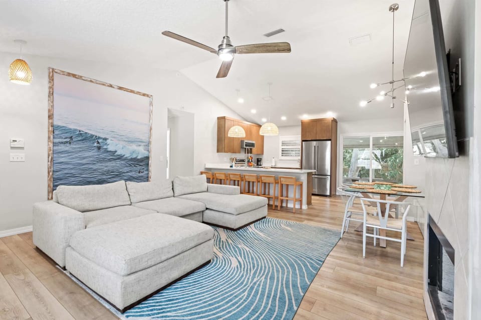 Open-concept living, dining, and kitchen space.