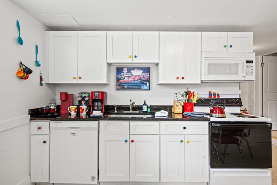 A well-equipped kitchen with all the basics, a dishwasher & a coffee maker