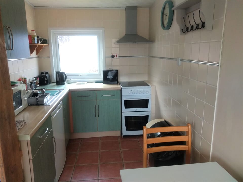 Kitchen off the sitting / dining area 