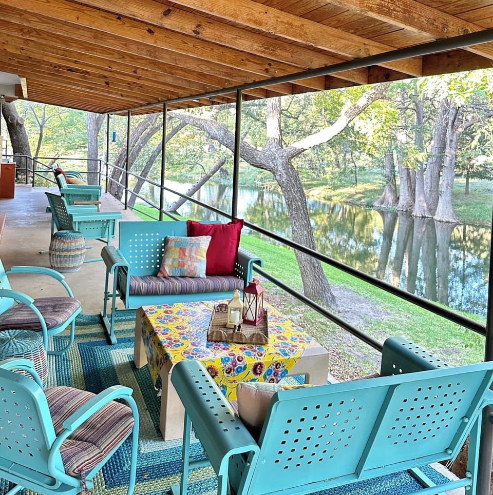 Main porch off main lodge living. Separate kitchen out here for pancakes!