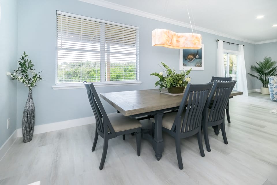 Dining room table, four chairs and bench comfortably seats six or seven