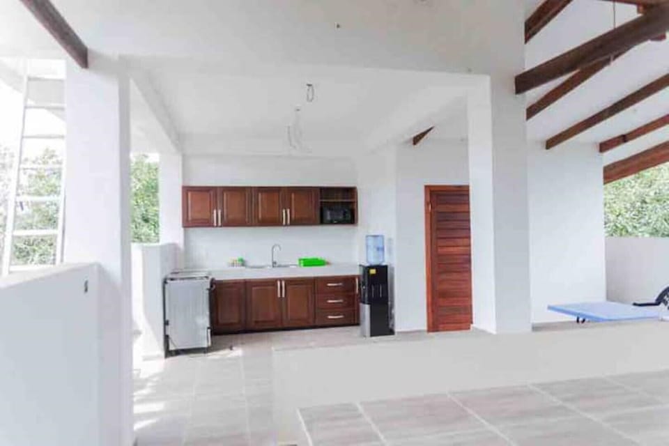 A full kitchen in the roof top terrace. You can cook, or we cook for you.