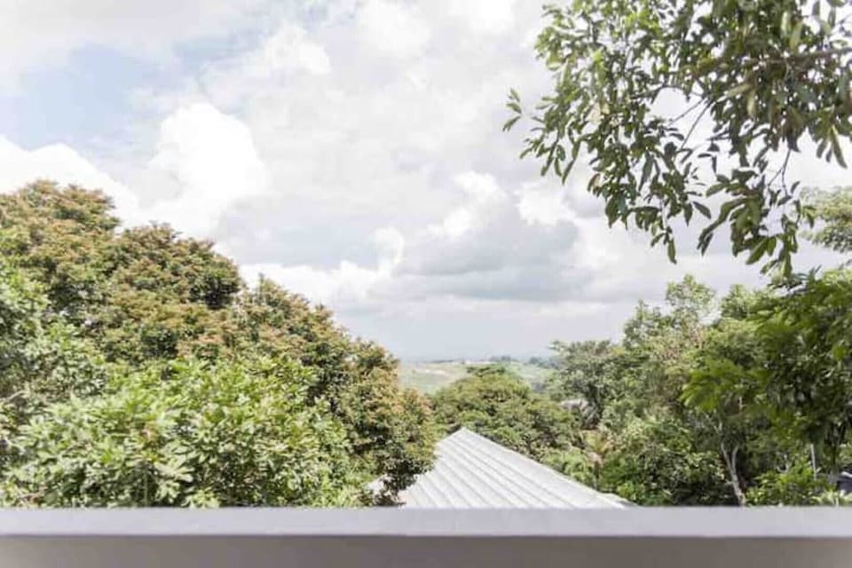 View to the South. Accra is visible in the distance, especially at night.
