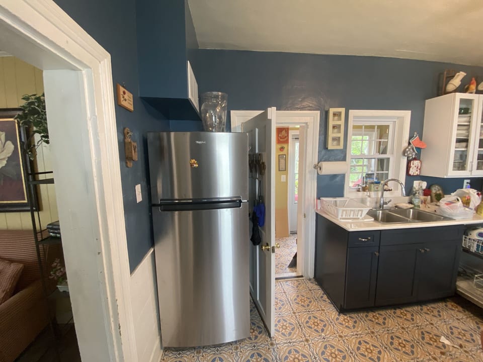 Spacious frig/freezer- more supplies just off the kitchen in the laundry room