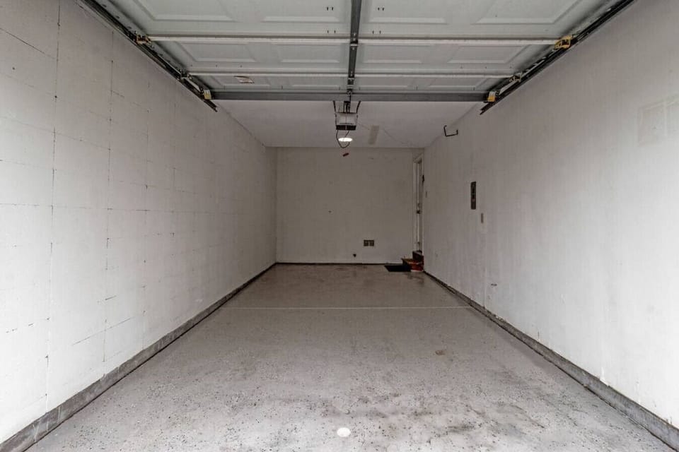 ATTACHED one car garage with automatic opener
