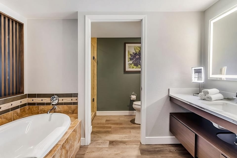 Soak away the day in a deep tub and calm space.
