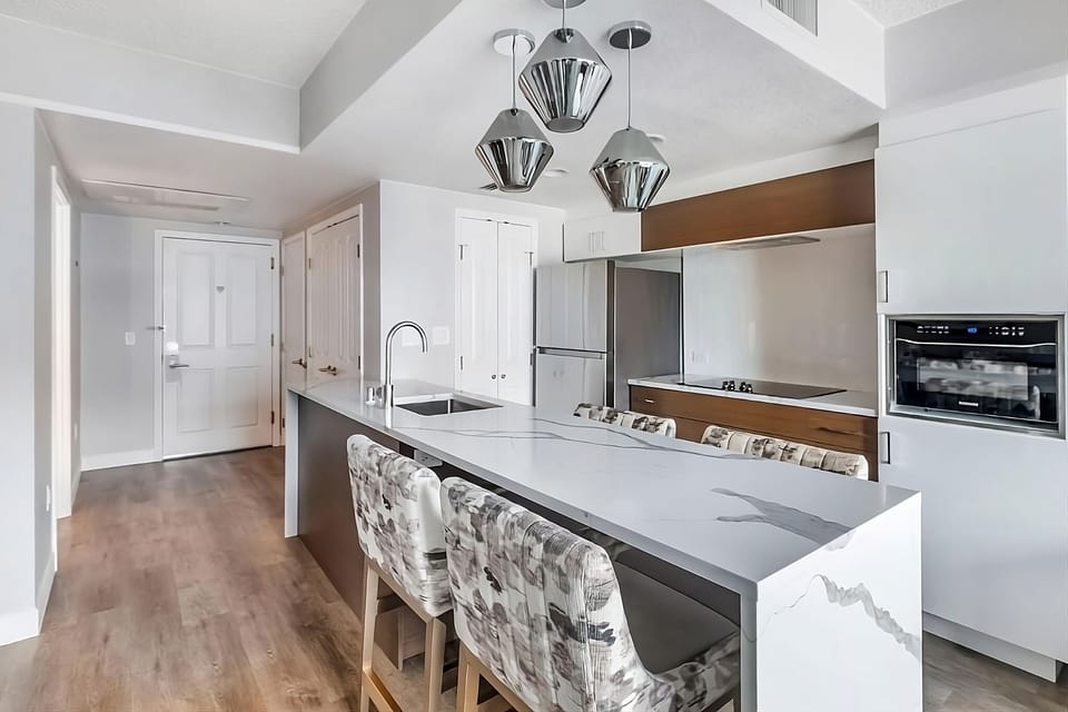 Cook together at the oversized island with stylish seating.