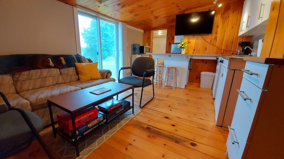 Living Area, Kitchen and Glass walkout onto deck
