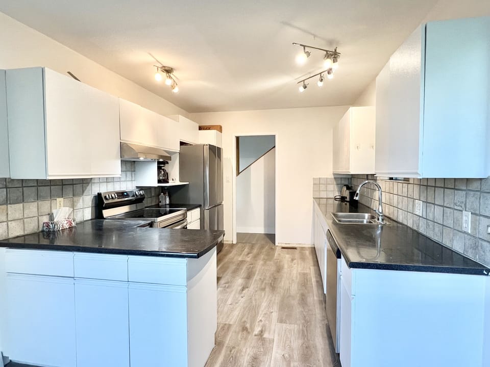 Kitchen:
Brand new appliences, floor, paint