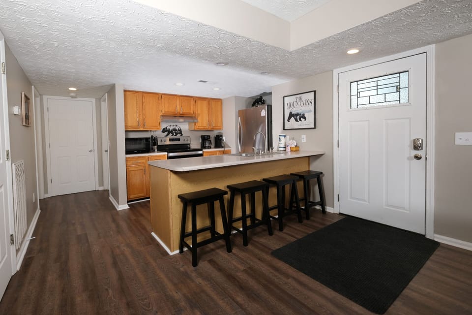View of front door and kitchen area - View of front door and kitchen area