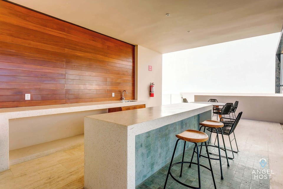 There's bar seating at the rooftop pool