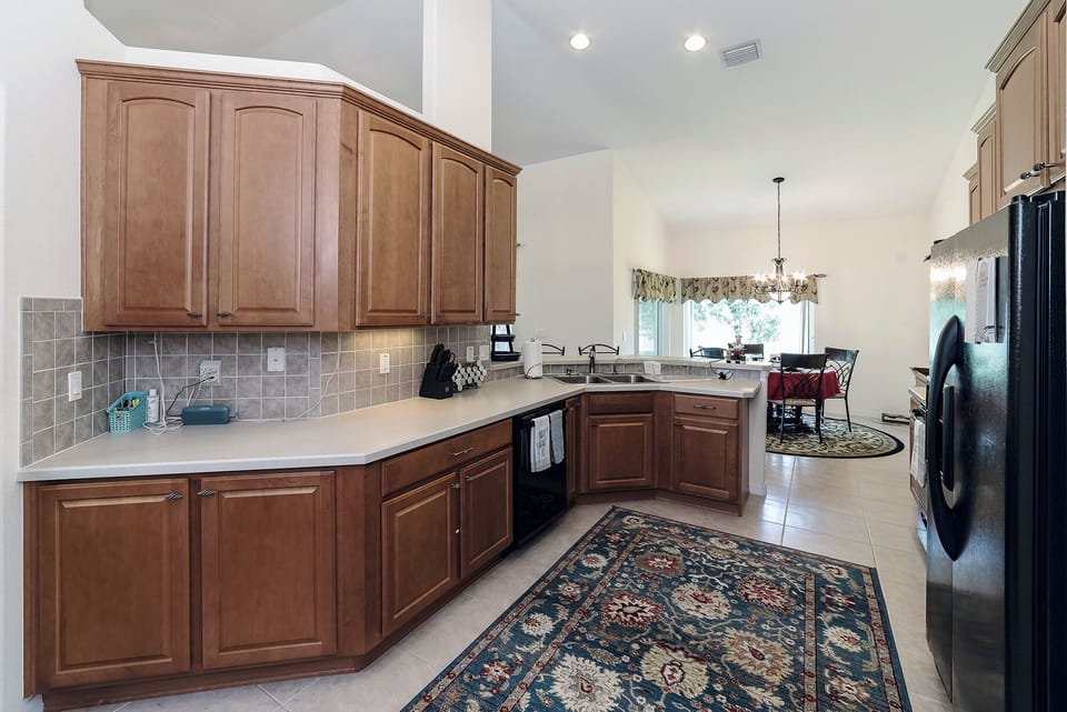 Kitchen: Dish Washer, Garbage Disposal, Microwave, 4 top Electric Oven. 