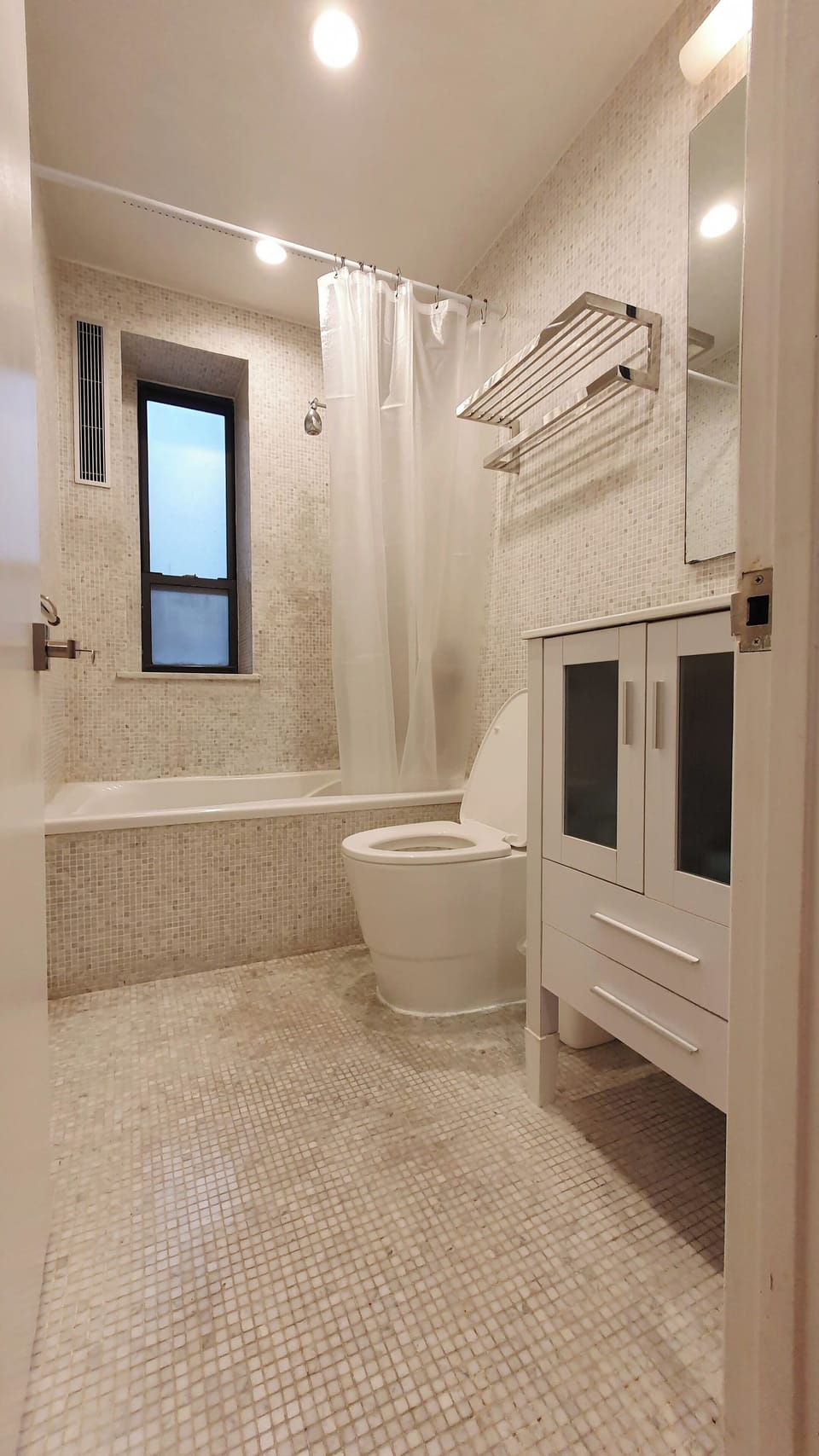Full bathroom with bathtub