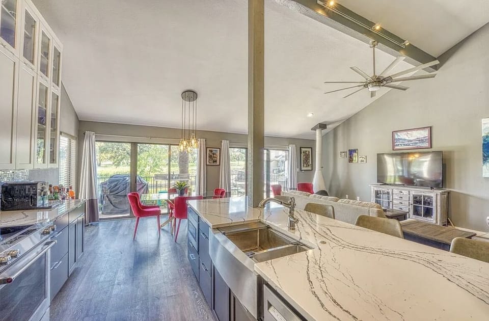 Open concept kitchen, dining and living room