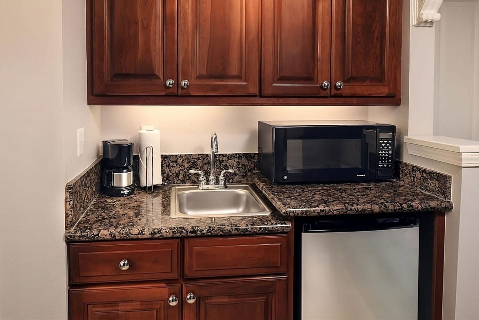 Start mornings with easy coffee and snacks in your kitchenette.