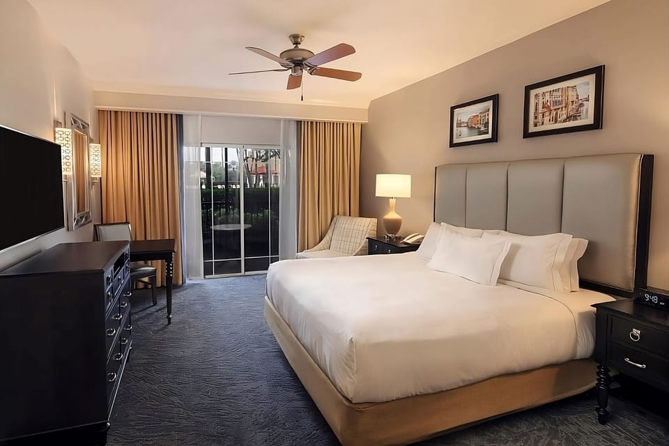 Settle into a spacious king room with breezy patio views.