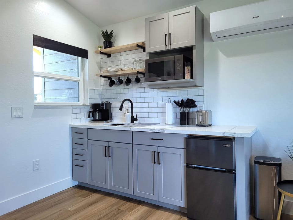 Kitchenette with coffee and cooking supplies