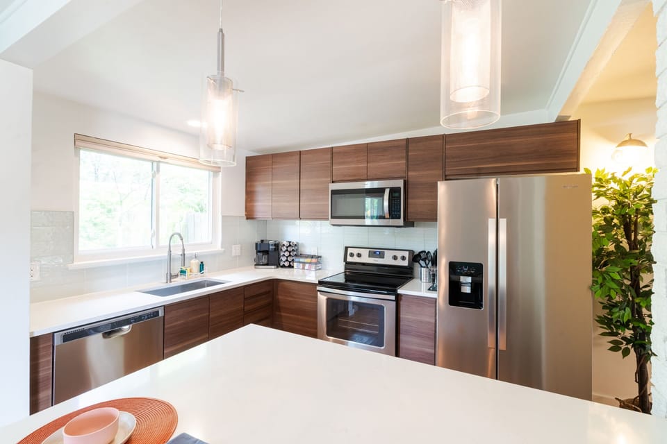 Minimalistic design of the kitchen complete with everything you would need
