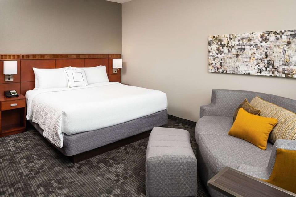 Drift into plush comfort with serene views and soft linens.
