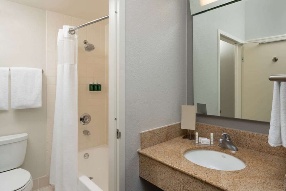 Refresh easily with a clean, bright bath and shower combo.