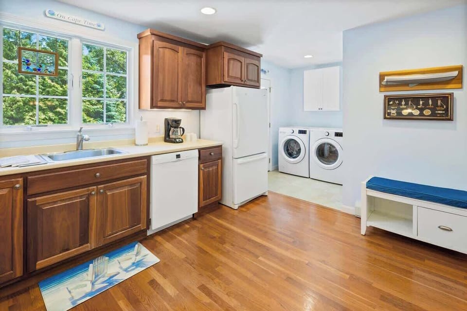 New washer and dryer conveniently located off the kitchen