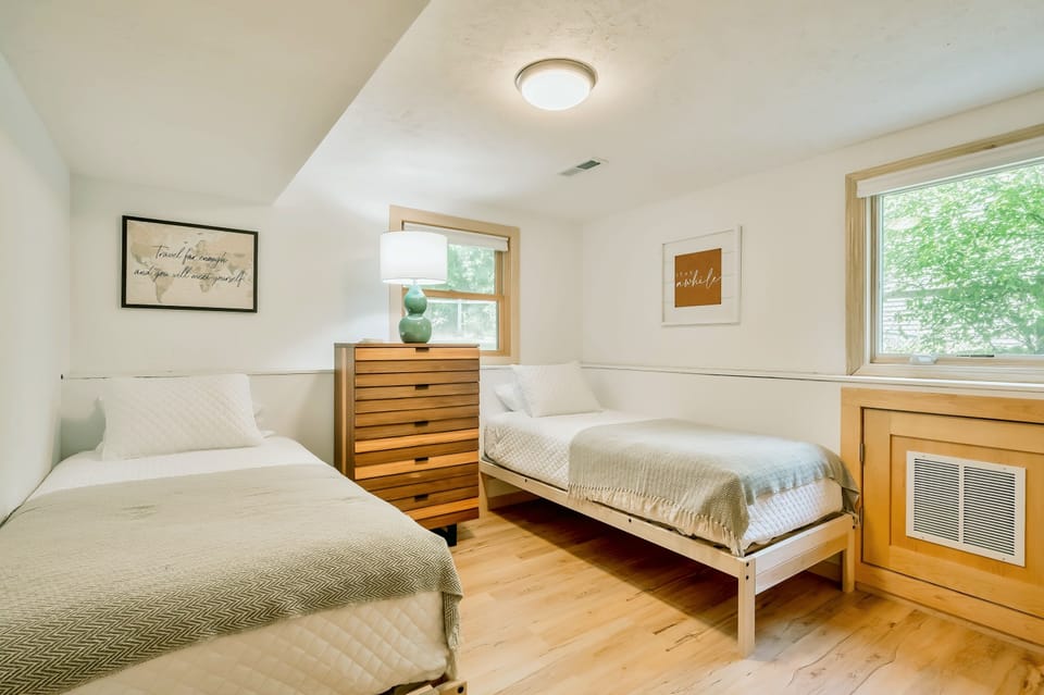 Double XL Twin lower level bedroom with attached bathroom & full closet