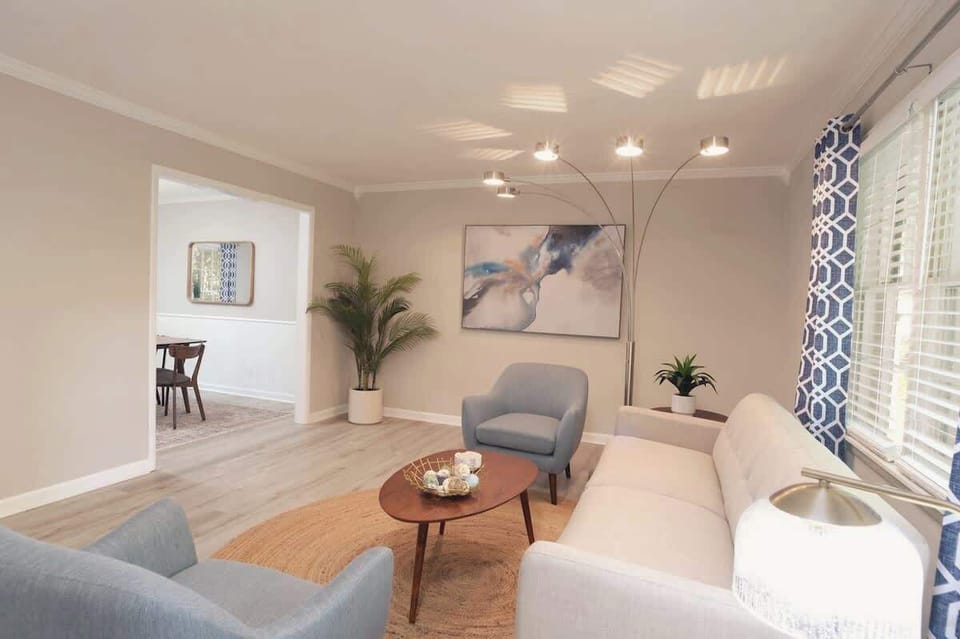 Chat in the Mansions stylish living room.