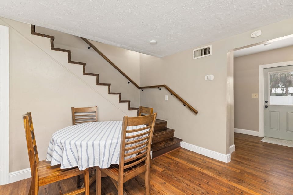 Kitchen Table that can extend to seat 6 people, with the view to the stairs.