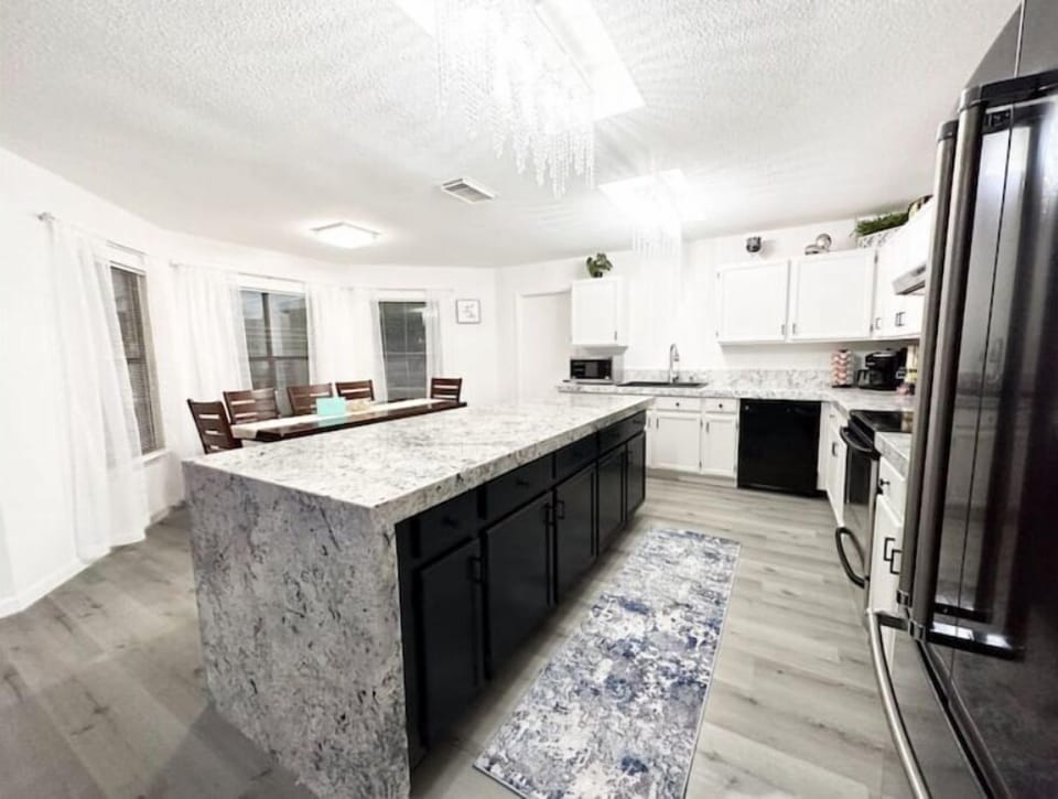Waterfall kitchen island with everything you need. 
