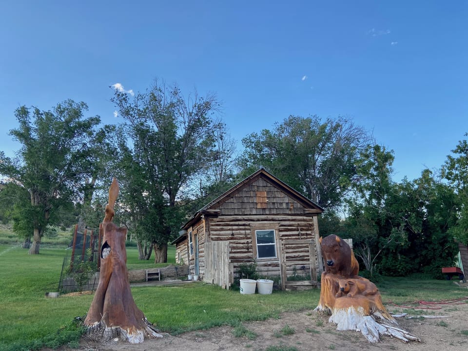 Side cabin  with tree carvings
