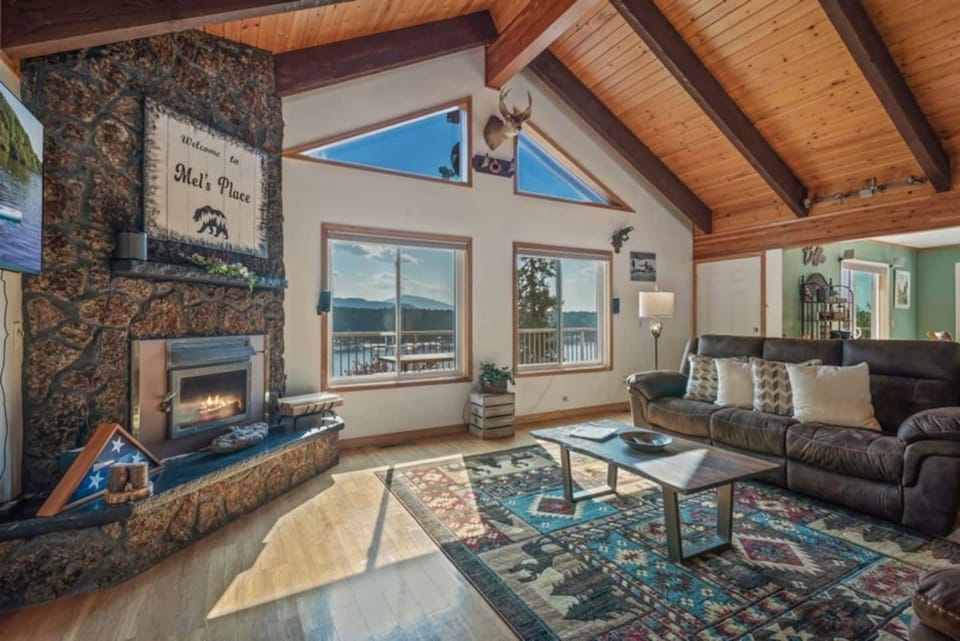 LIVING ROOM WITH COZY FIREPLACE
