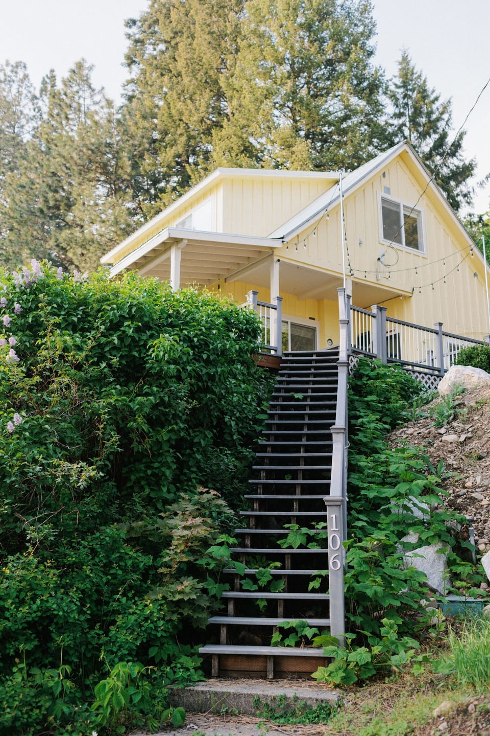 Stairs leading up from the middle of the driveway