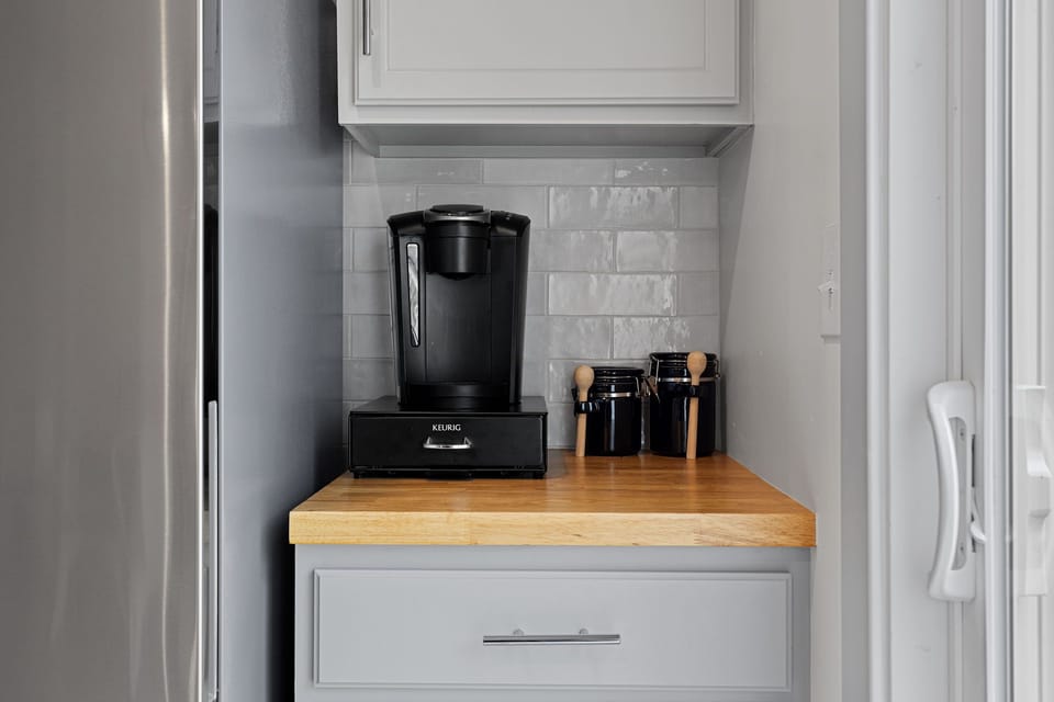 Coffee station with Keurig coffee maker.