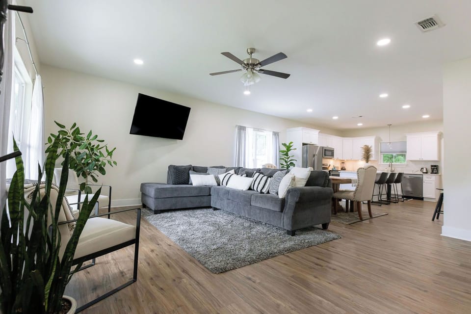 The living room with a 65” smart TV