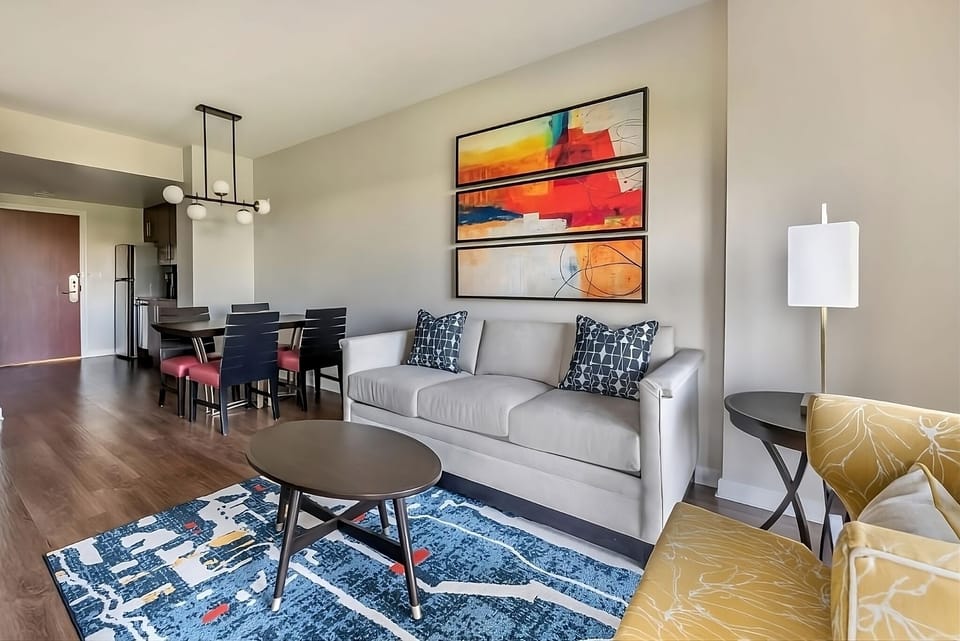 Gather and lounge comfortably in an open, stylish living area.