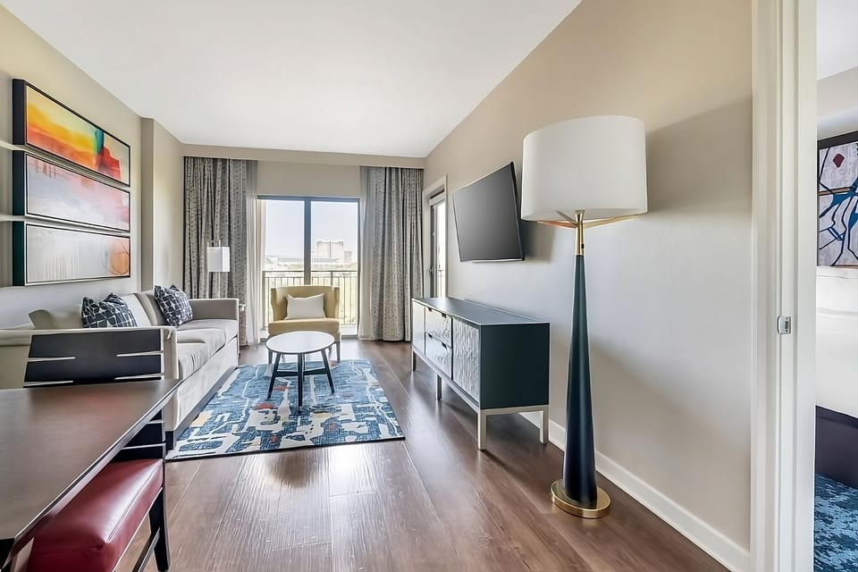 Stretch out on the sofa and enjoy airy balcony views.