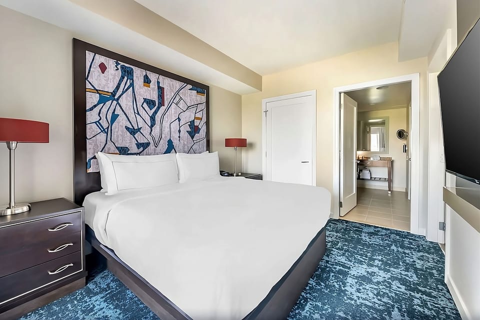 Settle in after adventures with a cozy, modern king retreat.