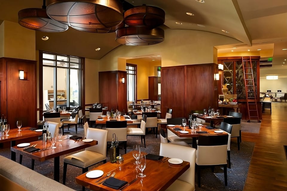 Savor a relaxed dinner in a warm, stylish dining room.