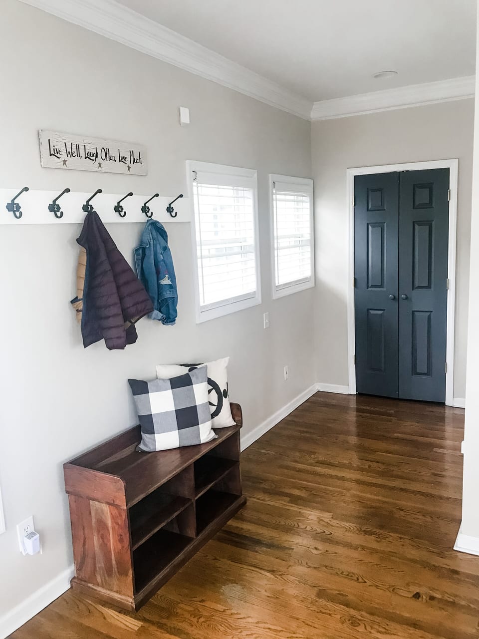 Rear entrance by garage has coat and shoe storage