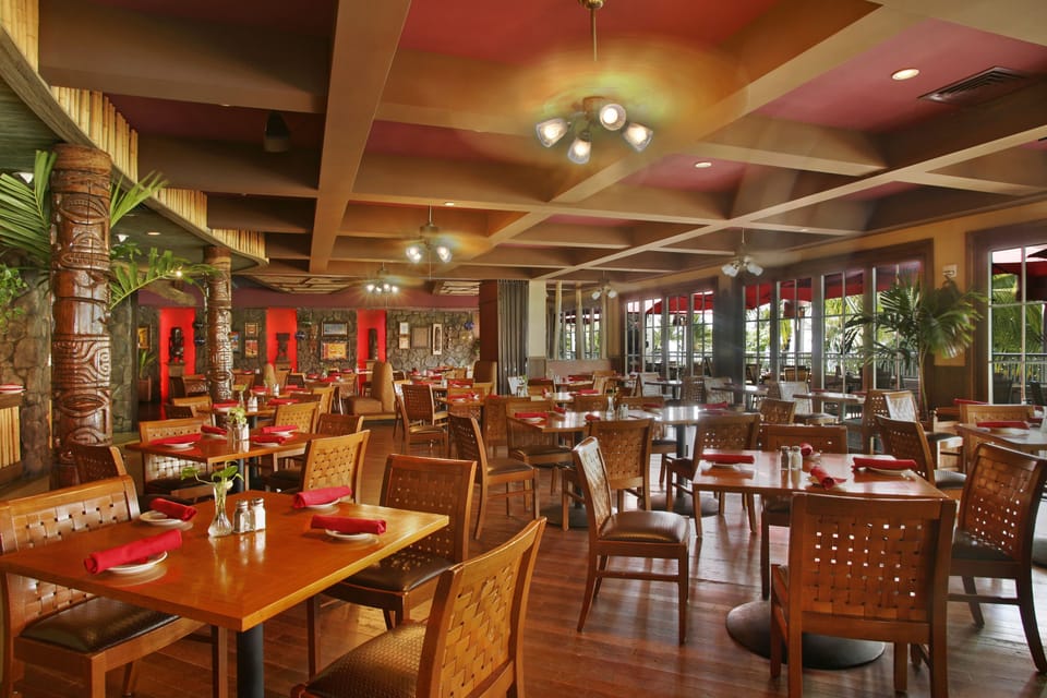 Dine together in a warm, island-inspired restaurant setting.