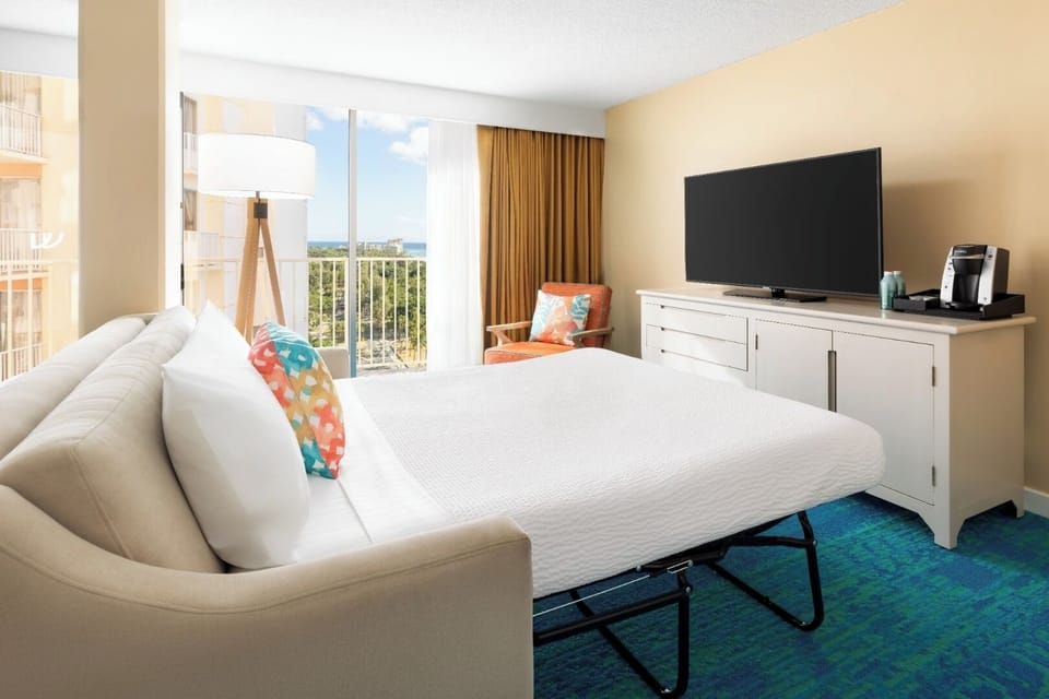 Unwind with a movie night and comfy sleeper sofa.