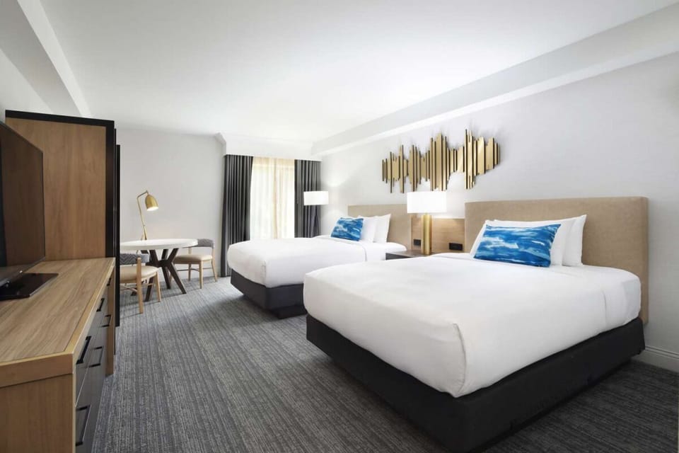 Unit with 2 Queen beds. Exact unit will be assigned upon arrival. Views, colors, and decor may vary.