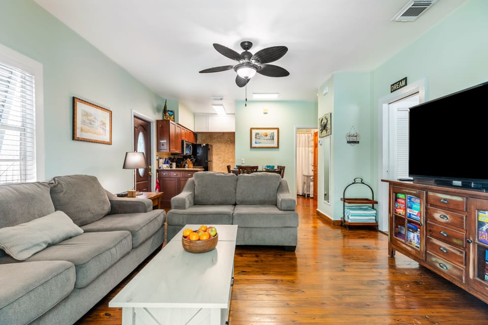 Living area with ceiling fans.