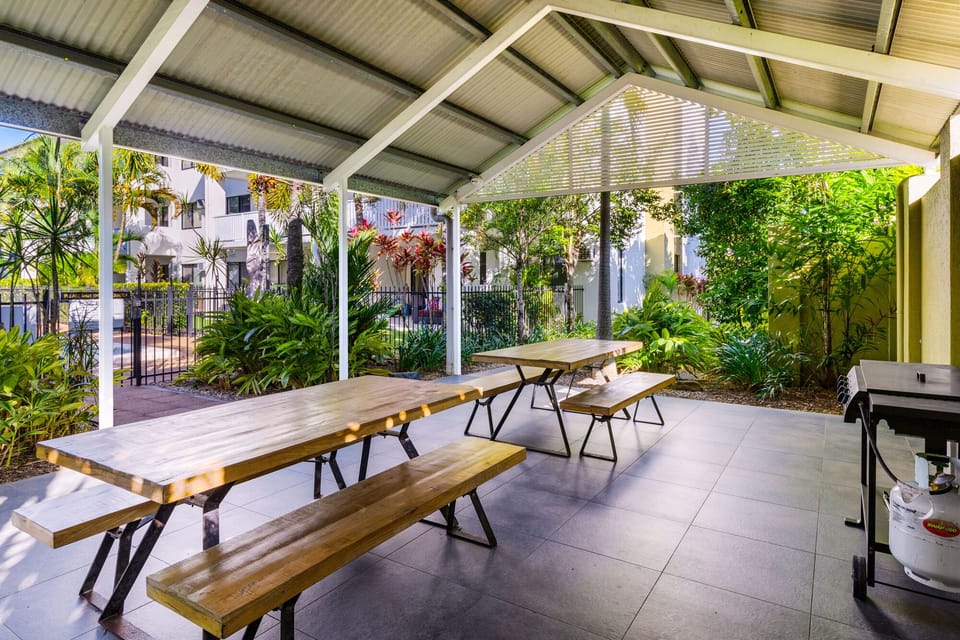 Complex bbq area next to the pool