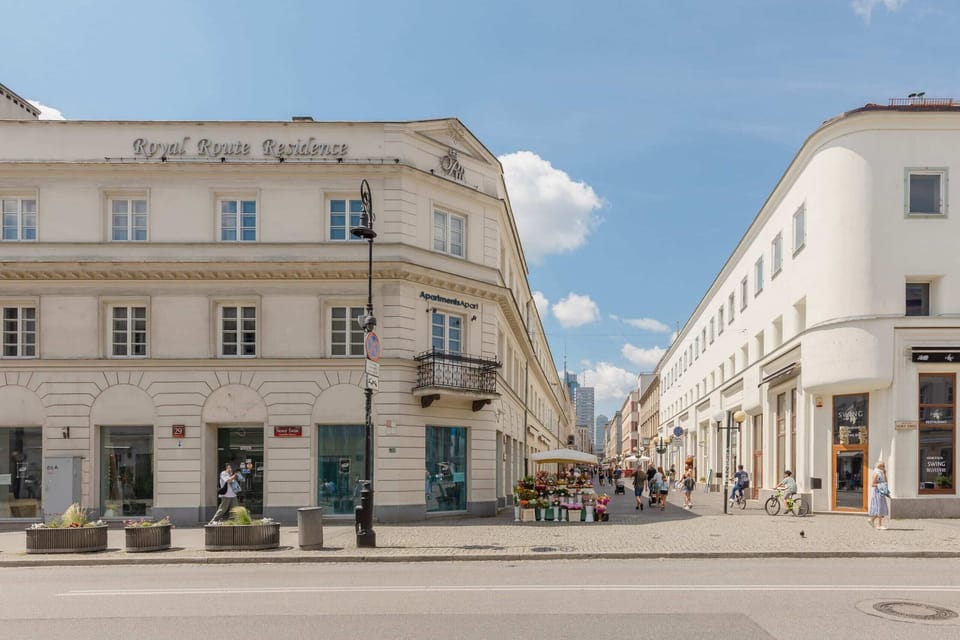 Picturesque shots of the historic building and charming surrounding streets, emphasizing the central location.