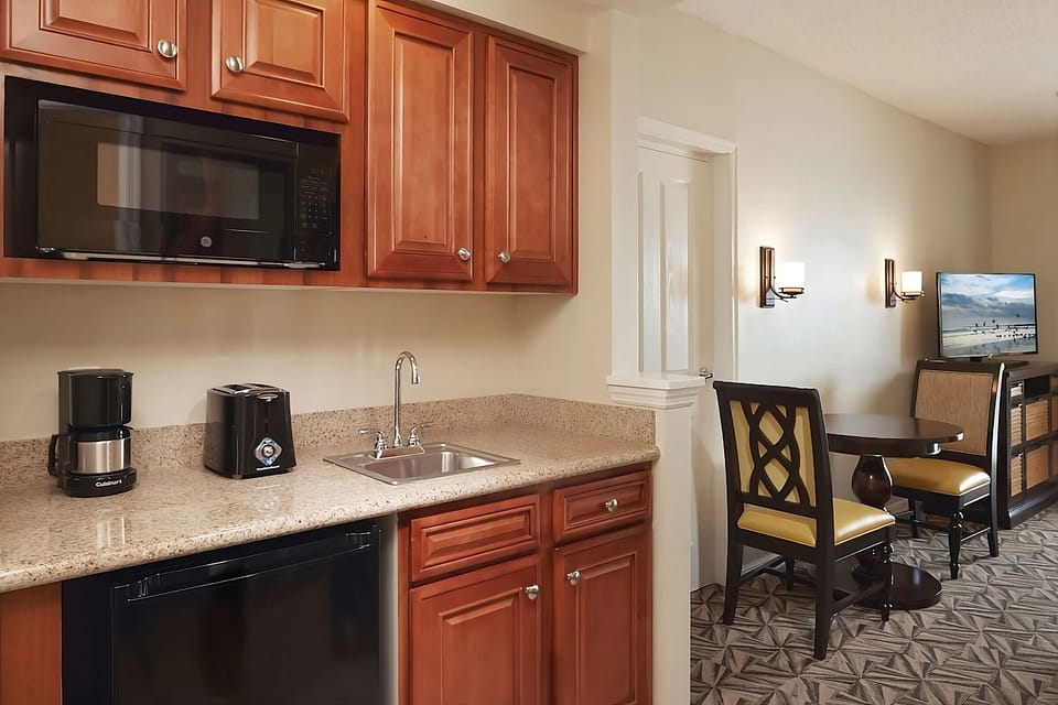 Start mornings with coffee and snacks from your convenient kitchenette.