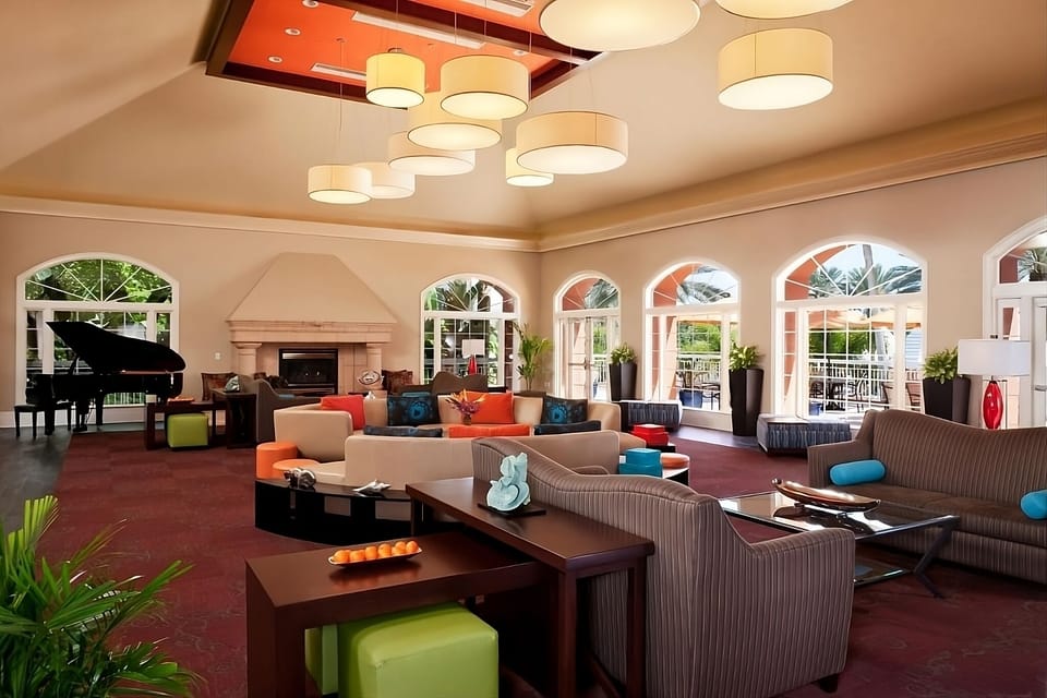 Unwind in the airy lounge with cozy seating and sunshine.
