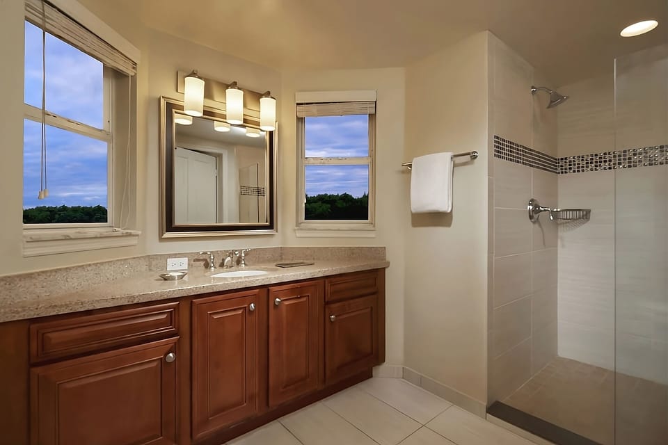 Start the day in a sunlit bath with spa-clean finishes.